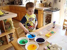 Hunter coloring eggs