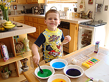 Hunter coloring eggs