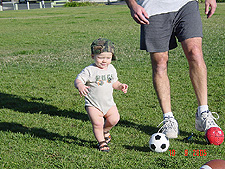 Hunter watching daddy outside.