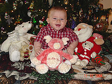 Hunter is all smiles when he thinks of all his presents under the tree...