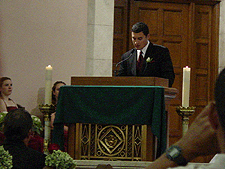 Ro's brother gives his reading.